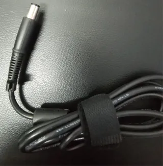 Cargador  portátil HP  519330.