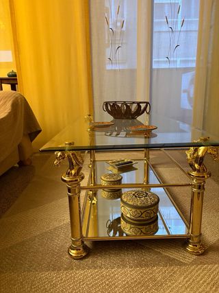 Mesa de centro cristal y metal dorado