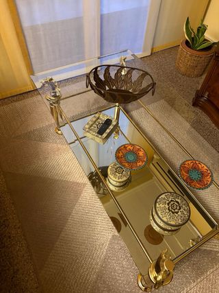 Mesa de centro cristal y metal dorado