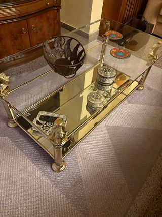 Mesa de centro cristal y metal dorado