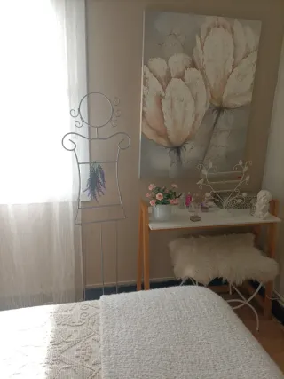 Perchero silueta mujer