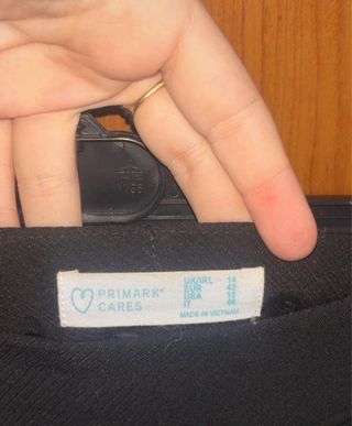 Minigonna nera con bottoni