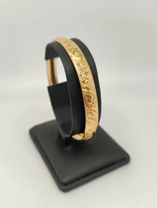 Pulsera rígida tipo caña oro 18kt labrada