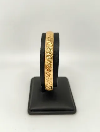 Pulsera rígida tipo caña oro 18kt labrada