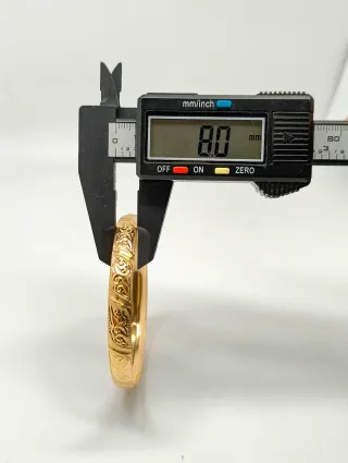 Pulsera rígida tipo caña oro 18kt labrada