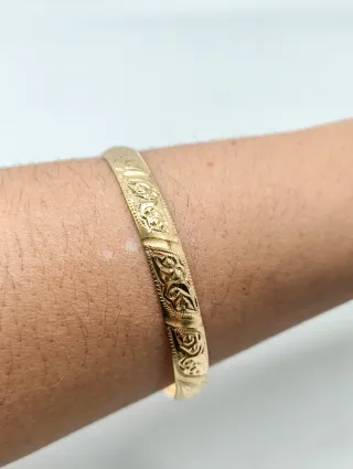 Pulsera rígida tipo caña oro 18kt labrada