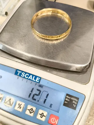 Pulsera rígida tipo caña oro 18kt labrada