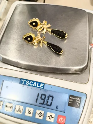 Pendientes lazo calado oro 18kt piedra palo santo