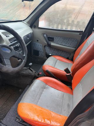 Coche sin carnet gris y naranja
