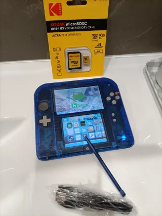 Nintendo 2DS edición especial 64gb juegos transp.