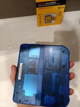 Nintendo 2DS edición especial 64gb juegos transp.