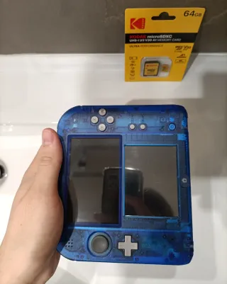 Nintendo 2DS edición especial 64gb juegos transp.