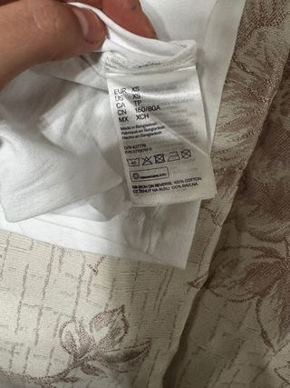 Camiseta H&M blanca con mensaje