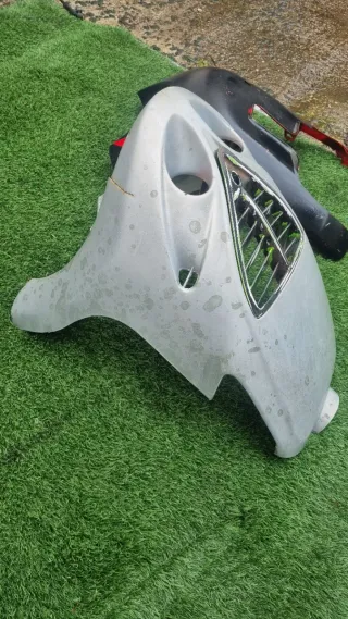 Tapas delantera Piaggio NRG