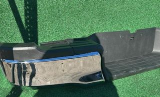 Paragolpes trasero toyota 385702 521520k090 hilux