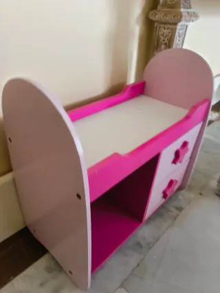 Cuna de juguete rosa