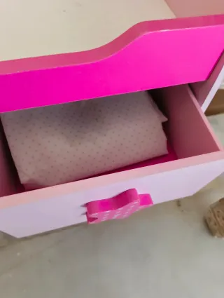 Cuna de juguete rosa