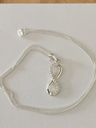 Colgante infinito plata con circonitas