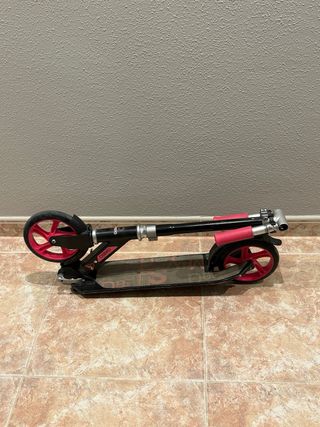 Patinete Decathlon rosa y negro