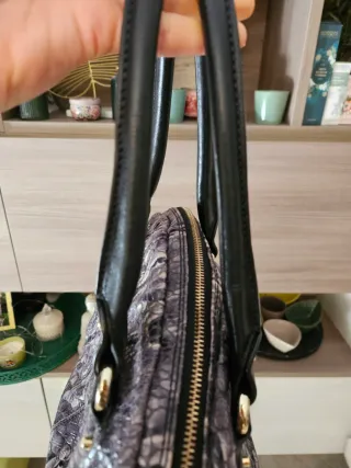 Borsa Coccinelle in pelle pitonata