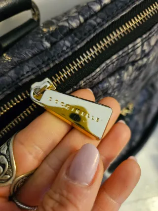 Borsa Coccinelle in pelle pitonata