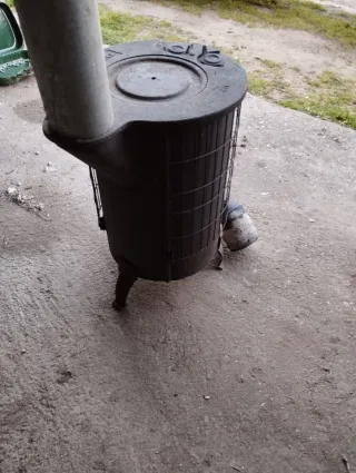 Estufa de leña metálica Theca