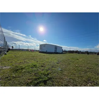 Parcela Rústica con dos casas prefabricada