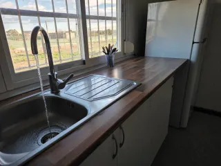 Parcela Rústica con dos casas prefabricada