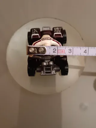 Moto de Juguete Marrón y Blanca