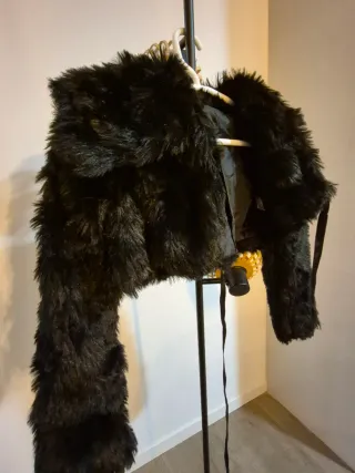 Torera pelo negro elegante