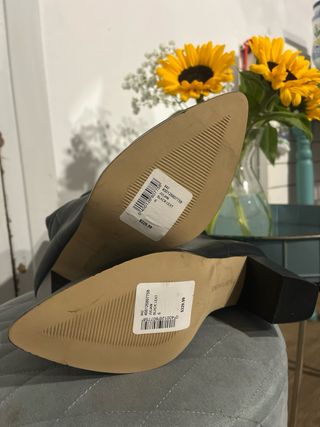 Botas altas de cuero chic negras