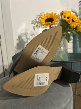 Botas altas de cuero chic negras