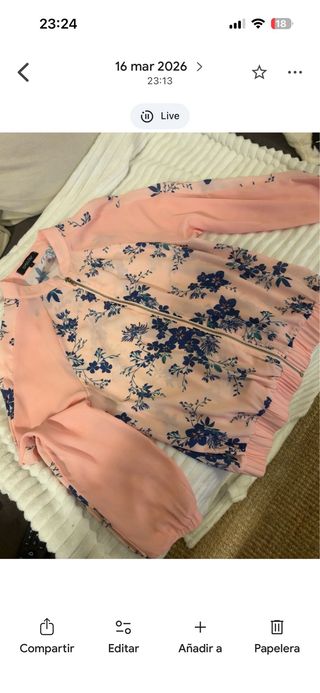 Blusa bomber floral con cremallera