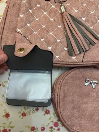 Mochila, bolso y monedero rosa