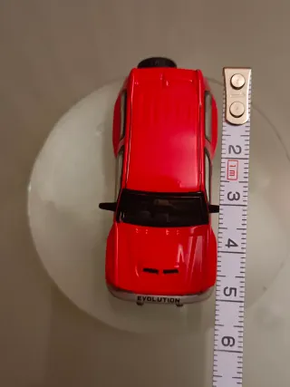 Coche de juguete rojo Evolution