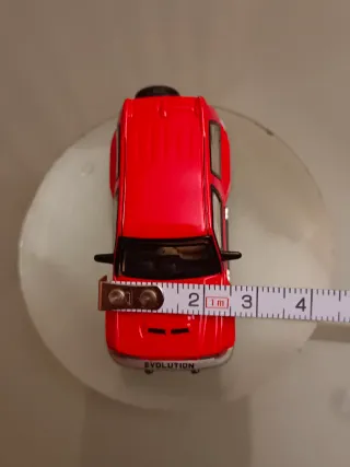 Coche de juguete rojo Evolution