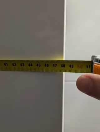 Mueble de baño blanco alto