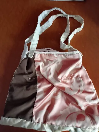 Borsa in tessuto dorato con dettagli rosa