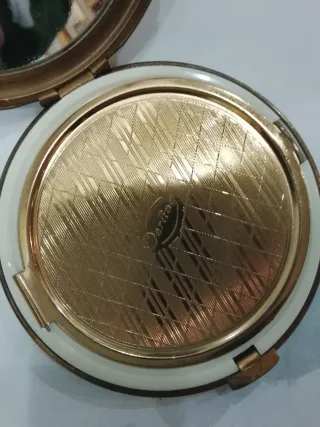 Portacipria dorato con decorazioni