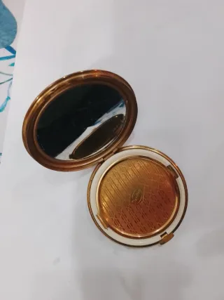 Portacipria dorato con decorazioni