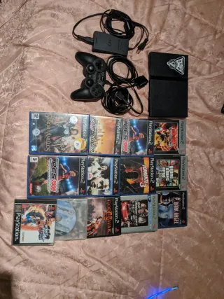 PlayStation 2 con 10 juegos esta como nueva