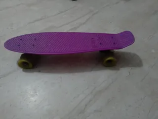 Monopatín Morado OXELO