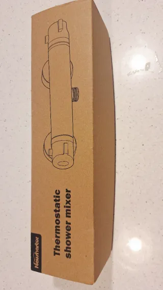 Grifo termostático ducha plata y turquesa