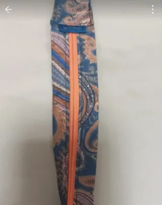 Accessorio da agganciare alla borsa