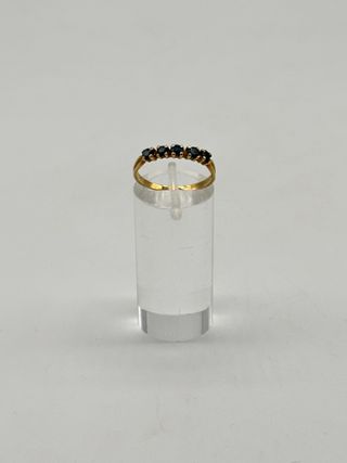 01-0136 ANILLO DE ORO CON PIEDRAS OSCURAS