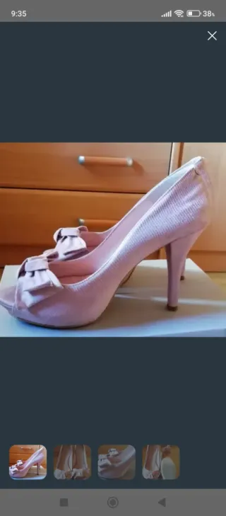 Zapatos de tacón rosa con lazo