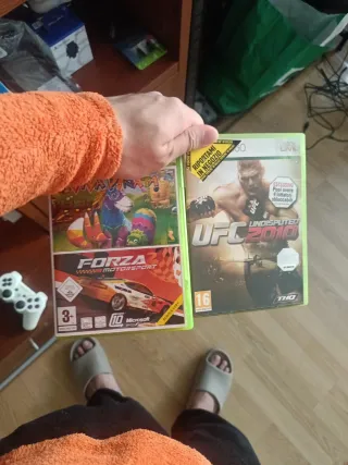 Xbox 360 con mando y juegos