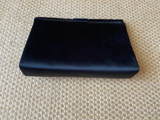 Clutch preta usada 1 vez