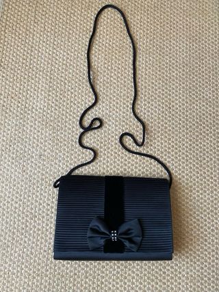 Clutch preta usada 1 vez