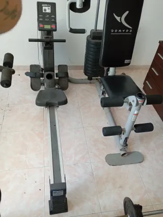 Máquina de remo y accesorios gimnasio